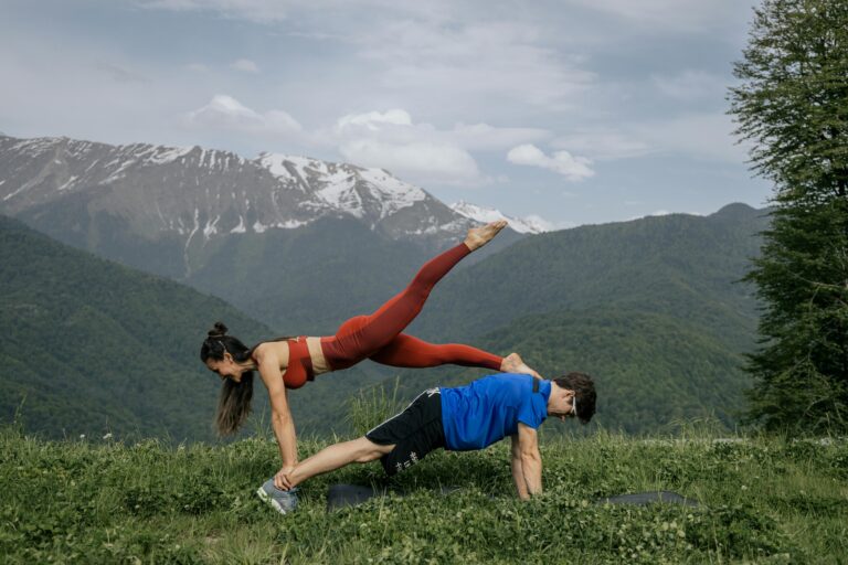Yoga trek in Nepal with travelers practicing yoga and meditation on scenic Himalayan mountain trails